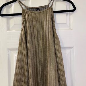 gold/gray high-neck tank.